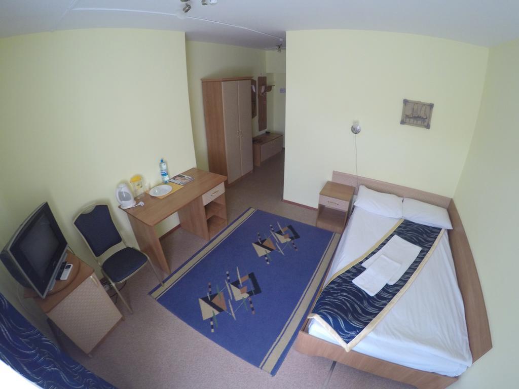 Kurmet Hotel Uralsk Quarto foto