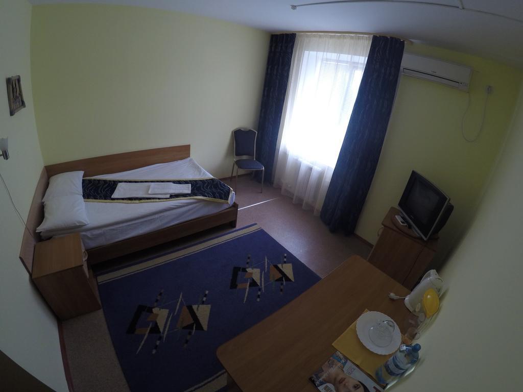 Kurmet Hotel Uralsk Quarto foto